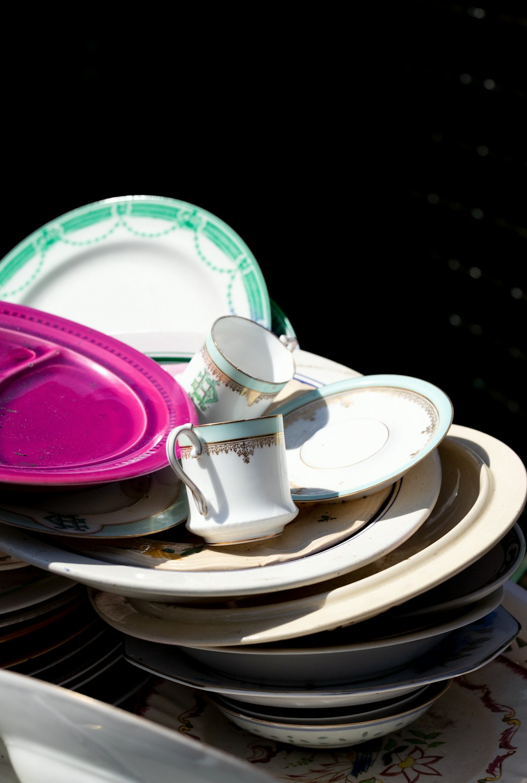 Stack of used plates and cups