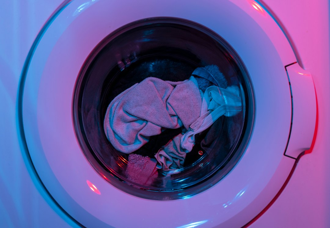 Clothes visible through a front-load washer door