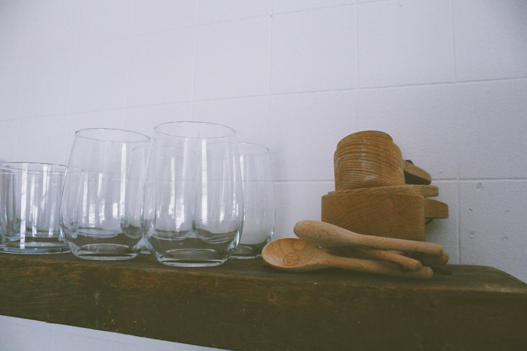 Clear drinking glasses on a countertop